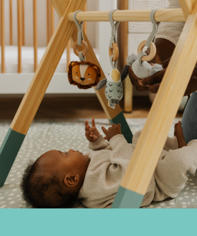Baby enjoying the Animal Adventure Play Gym
