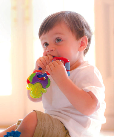 Baby using icy bite keys teether toy