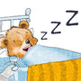 A bear is lying in bed while sleeping showing z's coming from their mouth depicting content snoring.