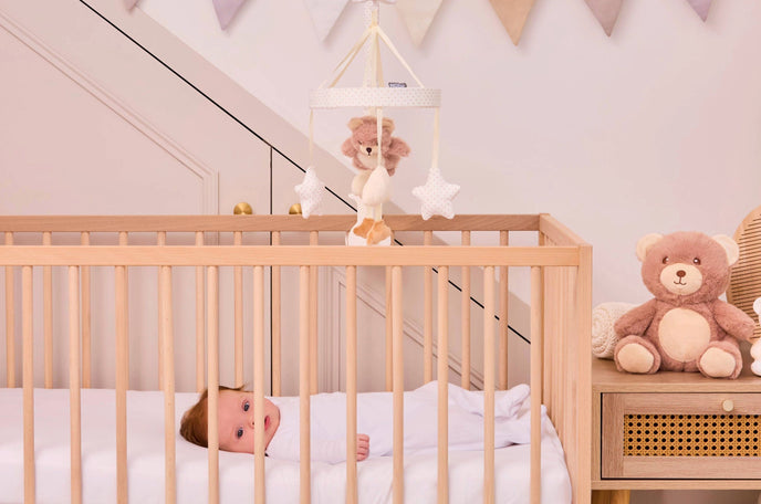Baby in cot