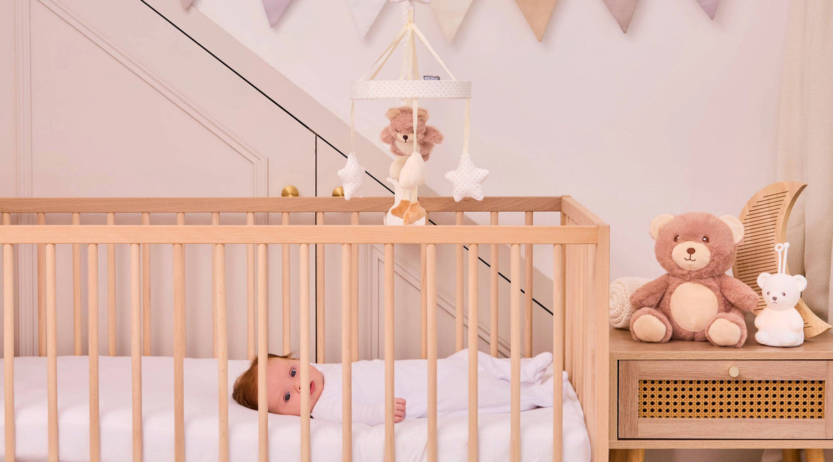 Baby in cot