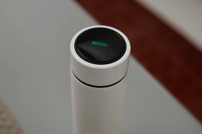 A RapidCool stood on a kitchen bench in white.