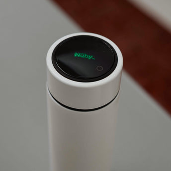 A RapidCool stood on a kitchen bench in white.