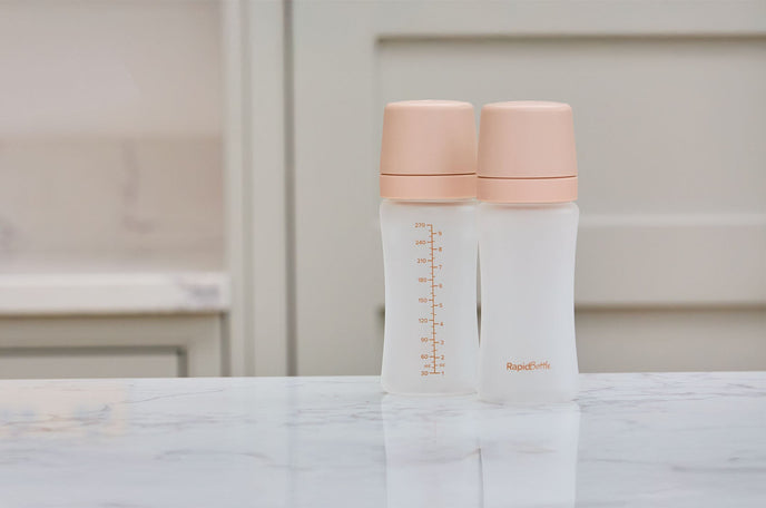 The Nuby RapidBottle sat on a kitchen counter top in the beige colourway.