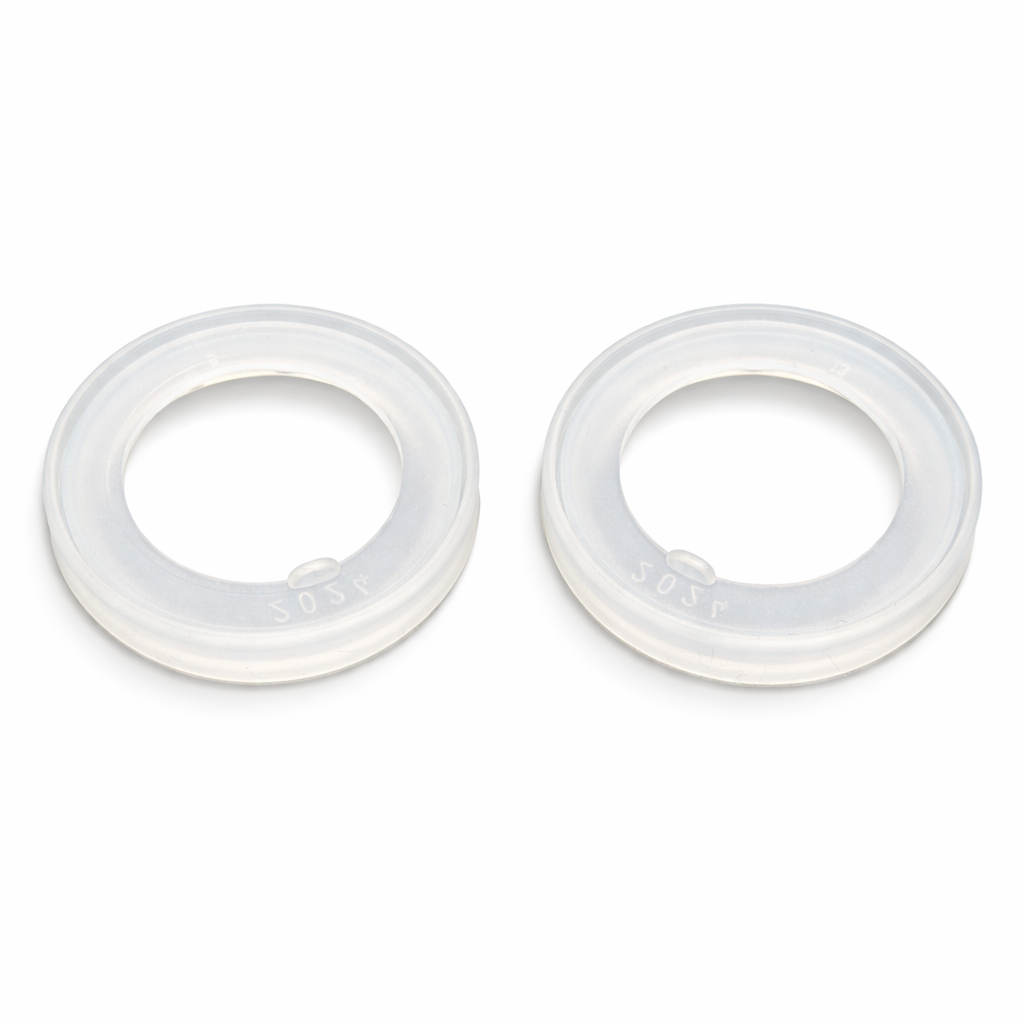 Two clear, round replacement seals for the RapidCool digital lid by Nuby UK are shown side by side on a white background. Each seal has a smooth surface with a slightly raised edge. Supplied in a 2 pack.