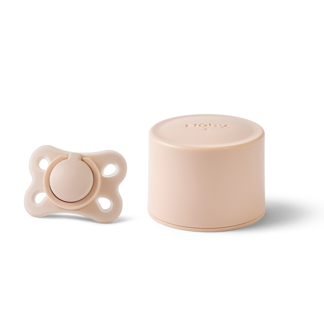 The RapidSoother Dummy & Pod in beige features a baby pacifier with a rounded shield alongside its matching cylindrical storage case, both displayed on a white background.