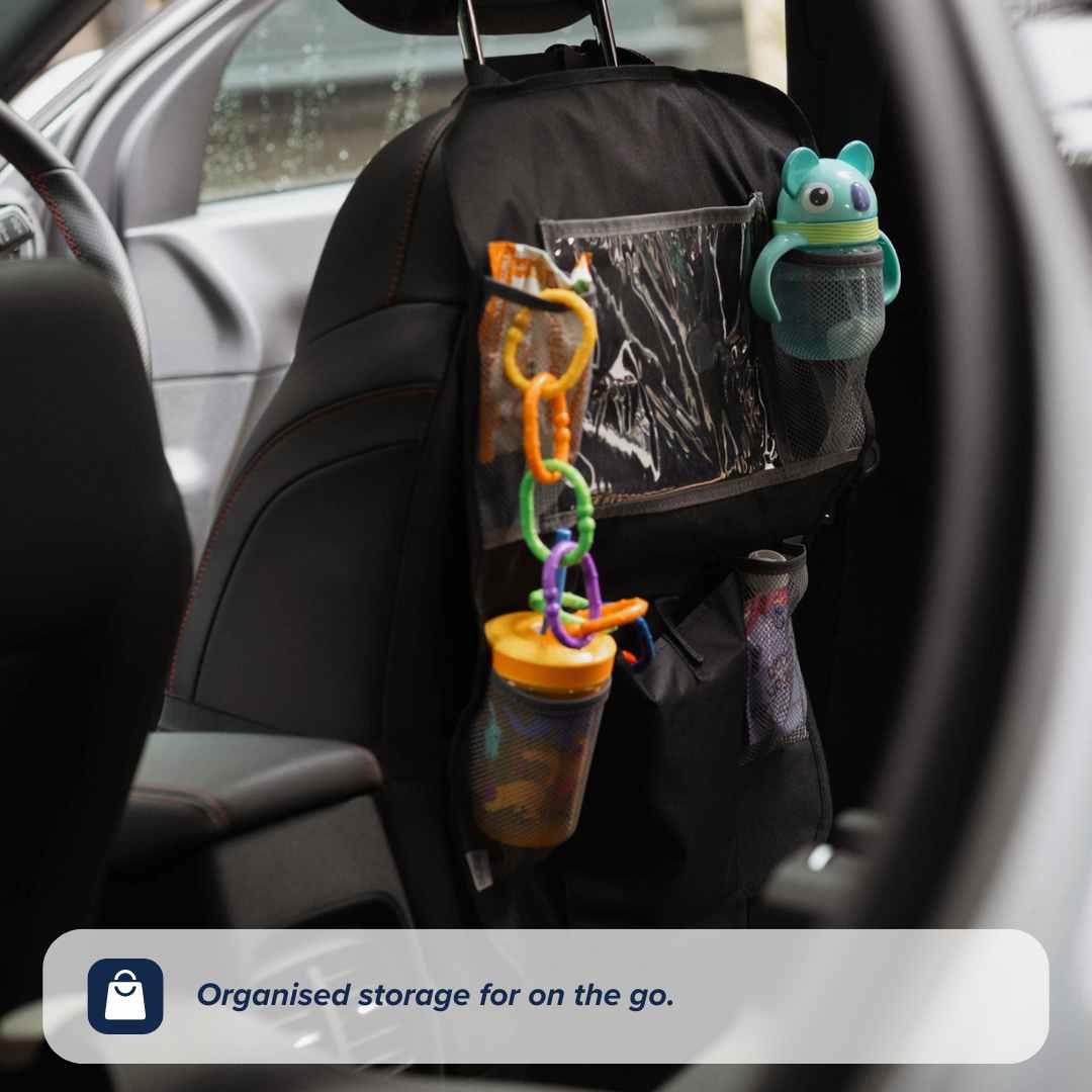 The Nuby Car Seat Organiser attaches to the front seat, keeping your child's drink, toys, and essentials within easy reach using extra pockets. Text overlay: Organised storage for on the go.