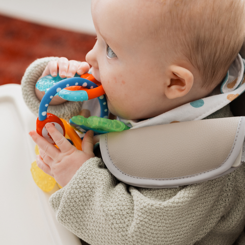 baby chewing teether, image linking to shop teether page