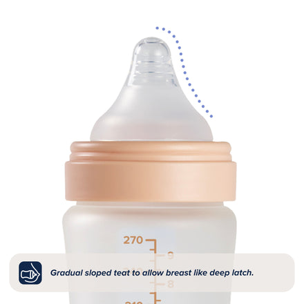 The Nuby UK RapidBottle Teats 2 Pack features a gradual sloped teat designed to support a breast-like deep latch, with a dashed blue line highlighting the slope. Text below reads: Gradual sloped teat to allow breast like deep latch.