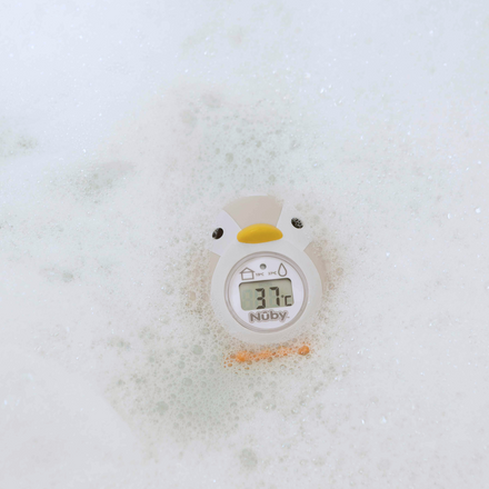 The Nuby UK Newborn Bath Support & Thermometer floats in the bath, shaped like a penguin, and displays water temperature (37.7°C) while providing cushioned support for your baby’s comfort.