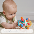A baby in light overalls lies on a play mat, intently reaching for the Twist Ball Teether. Text on the image reads, Helps develop fine motor skills.
