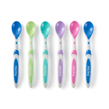 Six Baby Weaning Spoons are arranged in a row, each featuring white handles with brightly colored accents and the NUBY brand name printed on them. These spoons are perfect for weaning, with feeding heads available in vibrant shades of blue, green, turquoise, purple, pink, and blue.
