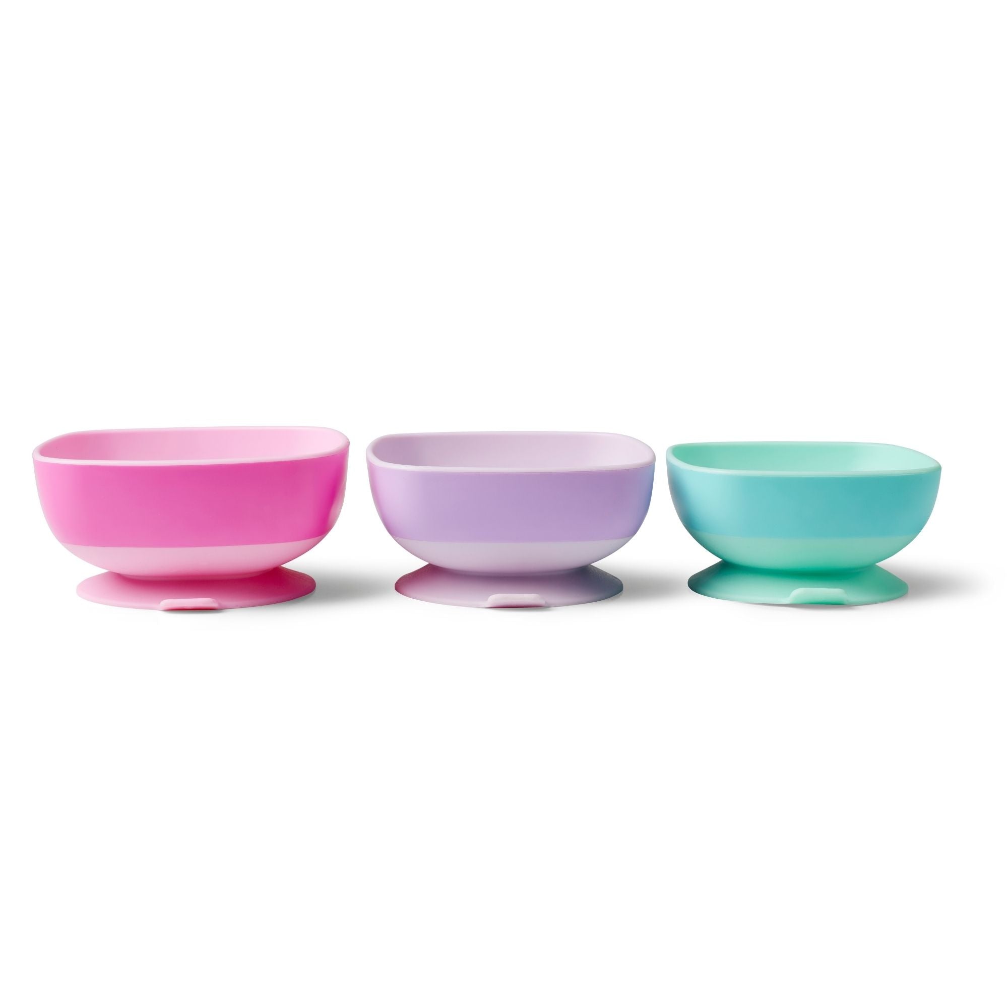 The Baby Suction Bowls Set of 3 includes pink, lavender, and teal bowls with wide round bases and a smooth, minimalist design—ideal for self-feeding and baby-led weaning.
