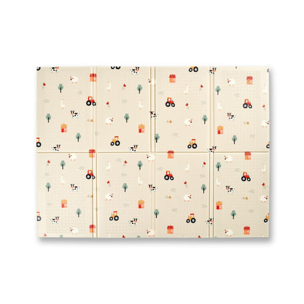 The Fold N Go Play Mat is a rectangular beige mat divided into eight sections, featuring a repeating farm-themed pattern with illustrations of cows, sheep, tractors, trees, and barns.