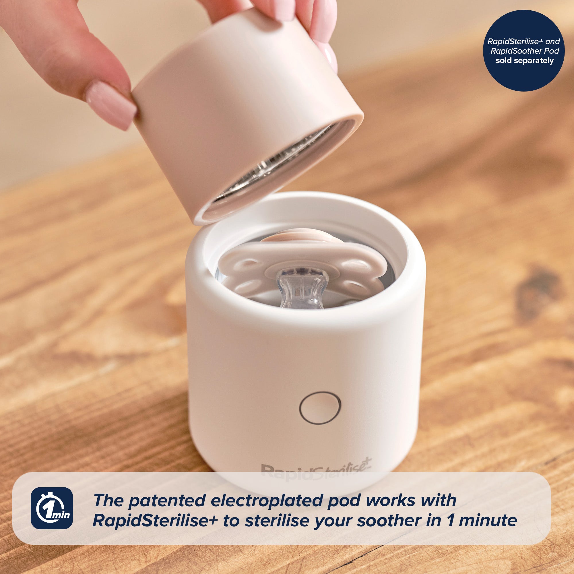 A hand lifts the lid off a white sterilising pod holding a RapidSoother dummy from the RapidSoother 2-pack. Text overlay explains the device sterilises soothers in just one minute using a patented pod and RapidSterilise+ pad (sold separately)—ideal for keeping your RapidSoother 2-pack of Dummies clean and ready for your baby.