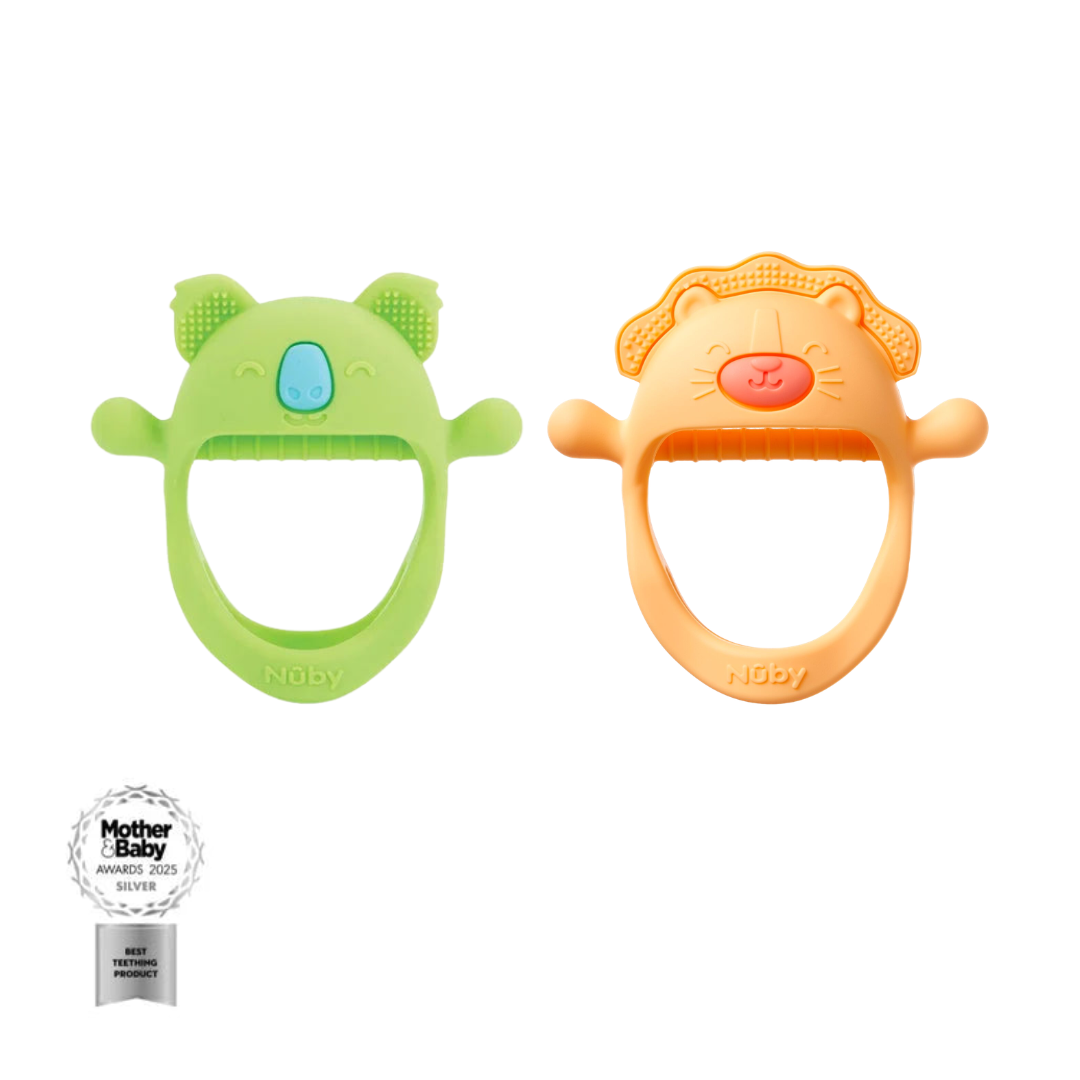 Two colorful Wrist Pal Silicone Teething Mitts are shown: one green with a bear face, one orange with a lion face. Both have textured surfaces and handles, ideal as baby teething toys. A 2023 Mother & Baby Awards Silver Winner badge is at the bottom left.