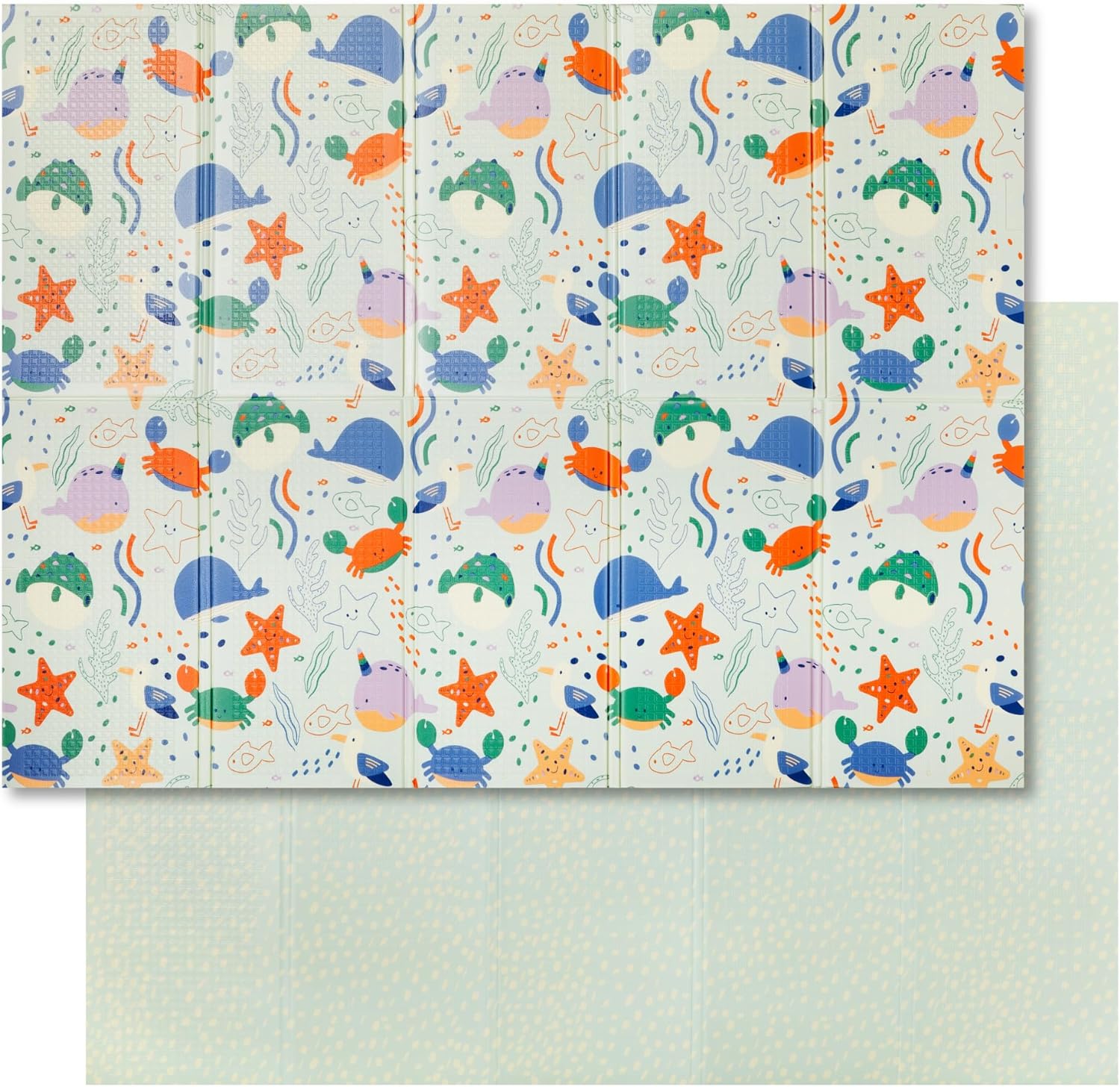 The Nuby Foldable Play Mat, Ocean Friends, features colorful cartoon whales, turtles, crabs, starfish, and fish. The reverse side is light blue with tiny white dots.