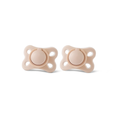Two identical RapidSoother dummies in beige, each with a round center and a wavy, butterfly-shaped base featuring four ventilation holes, are positioned side by side on a white background. This 2-pack of orthodontic soothers provides gentle comfort for your newborn.