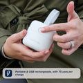 A hand presses the button on a white RapidSterilise UV Soother Steriliser with strap. Text: Portable, USB rechargeable, rapid sterilising; delivers up to 75 uses per charge.