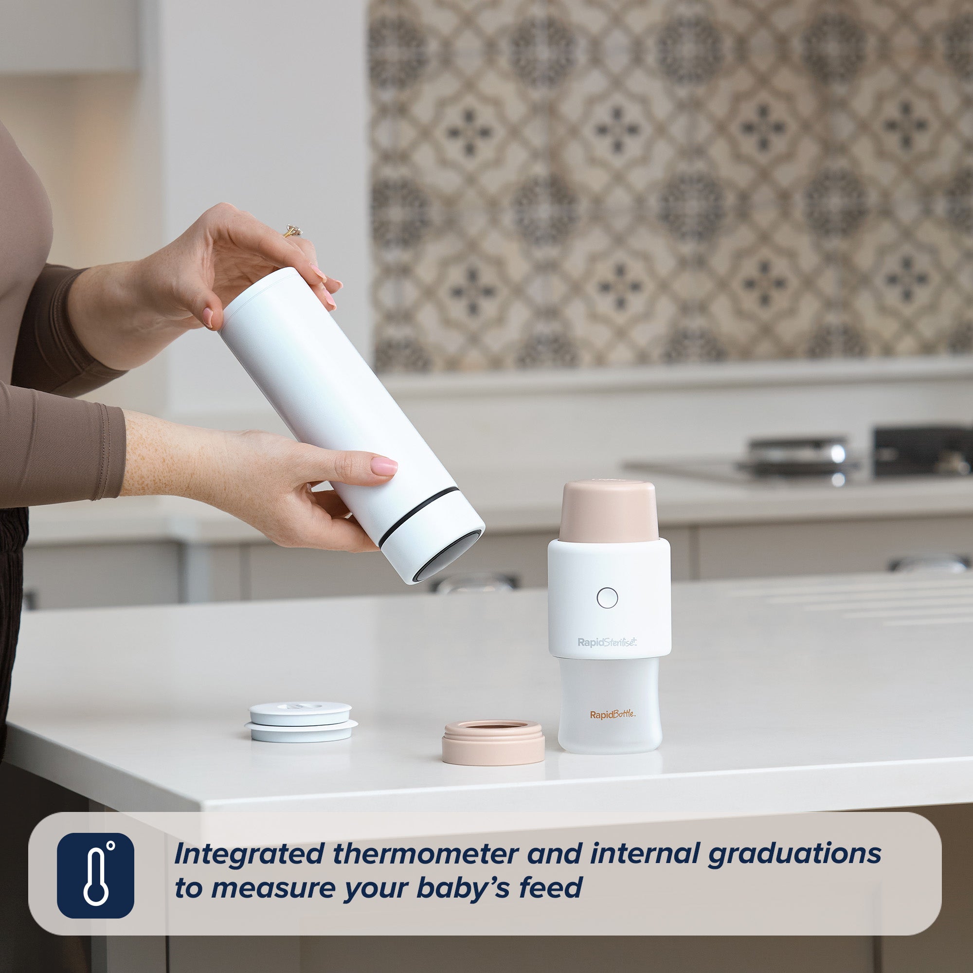 A woman turning around the RapidCool so that it can start getting to work on cooling the liquid inside the flask. RapidSterilise+ is also fitted to the RapidBottle that is sterilising it while the RapidCool is working.
