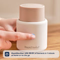 A hand touches the top of a small, white, cylindrical RapidSoother Dummy & Pod. Text reads: RapidSoother Dummy & Pod kills 99.9% of bacteria in 1 minute at home or on the go.