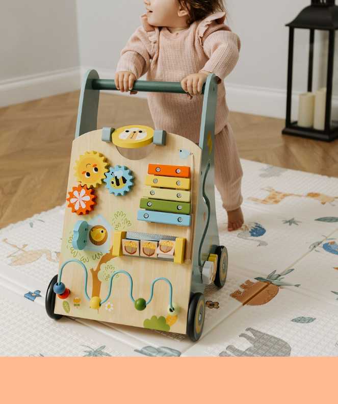 Child pushing wooden baby walker. Our Wooden Baby Walker is now 43% off, save £23 on the cutest way to get those little legs moving.