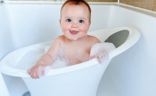 Baby bath with store built in seat