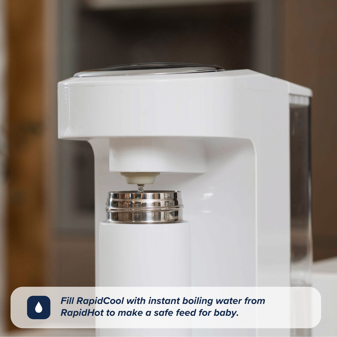 The RapidHot dispensing water into the RapidCool by Nuby.