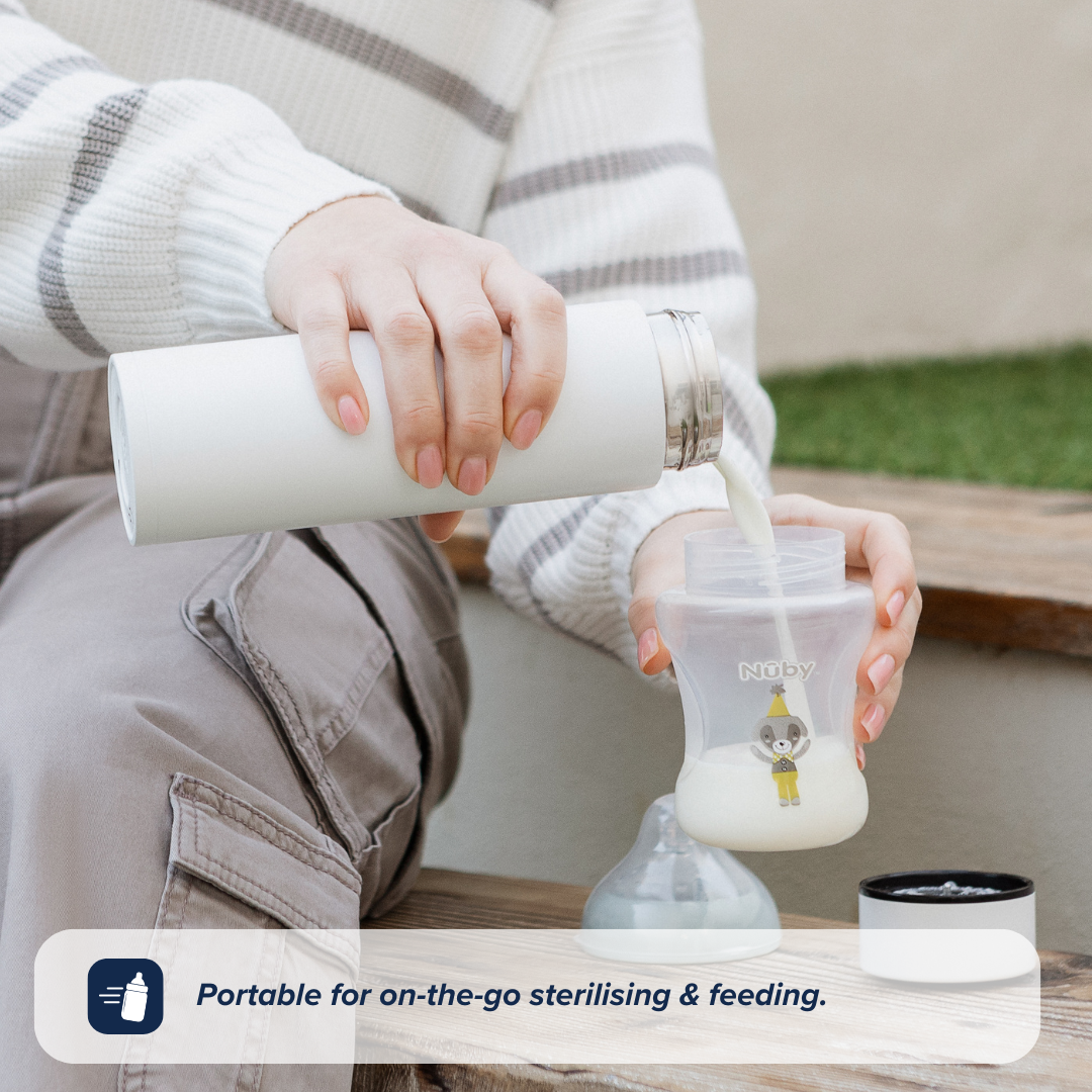 A person pouring feed from a RapidCool while on their travels into a bottle for a baby.