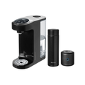 The Nuby UK Formula Making Set is a sleek black single-serve maker with a digital display and rapidcool technology, including a matching travel mug and cylindrical accessory, all shown on a white background.