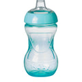 The Nuby Mini Easy Grip Baby Cup is a clear plastic cup with a light blue lid and base, featuring a contoured shape for easy gripping and the Nuby logo embossed on the lower part.