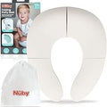 The Foldable Toilet Seat set includes a white folding seat, a carrying pouch with the Nuby logo, and packaging featuring a toddler and potty training info.