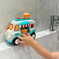 Ice cream bath toy by Nuby. Stood up on a bath.
