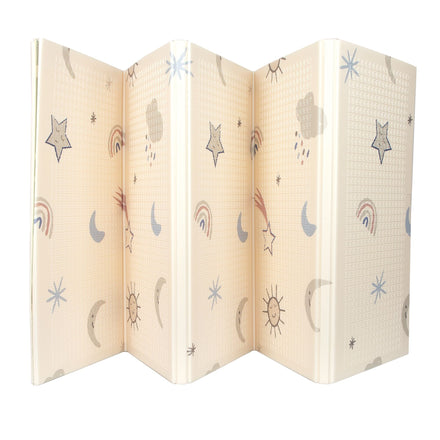 The Nuby Foldable Play Mat, Stars, is a cream-colored reversible foam mat with a textured surface decorated in soft pastels with cartoon stars, moons, suns, rain clouds, and rainbows.