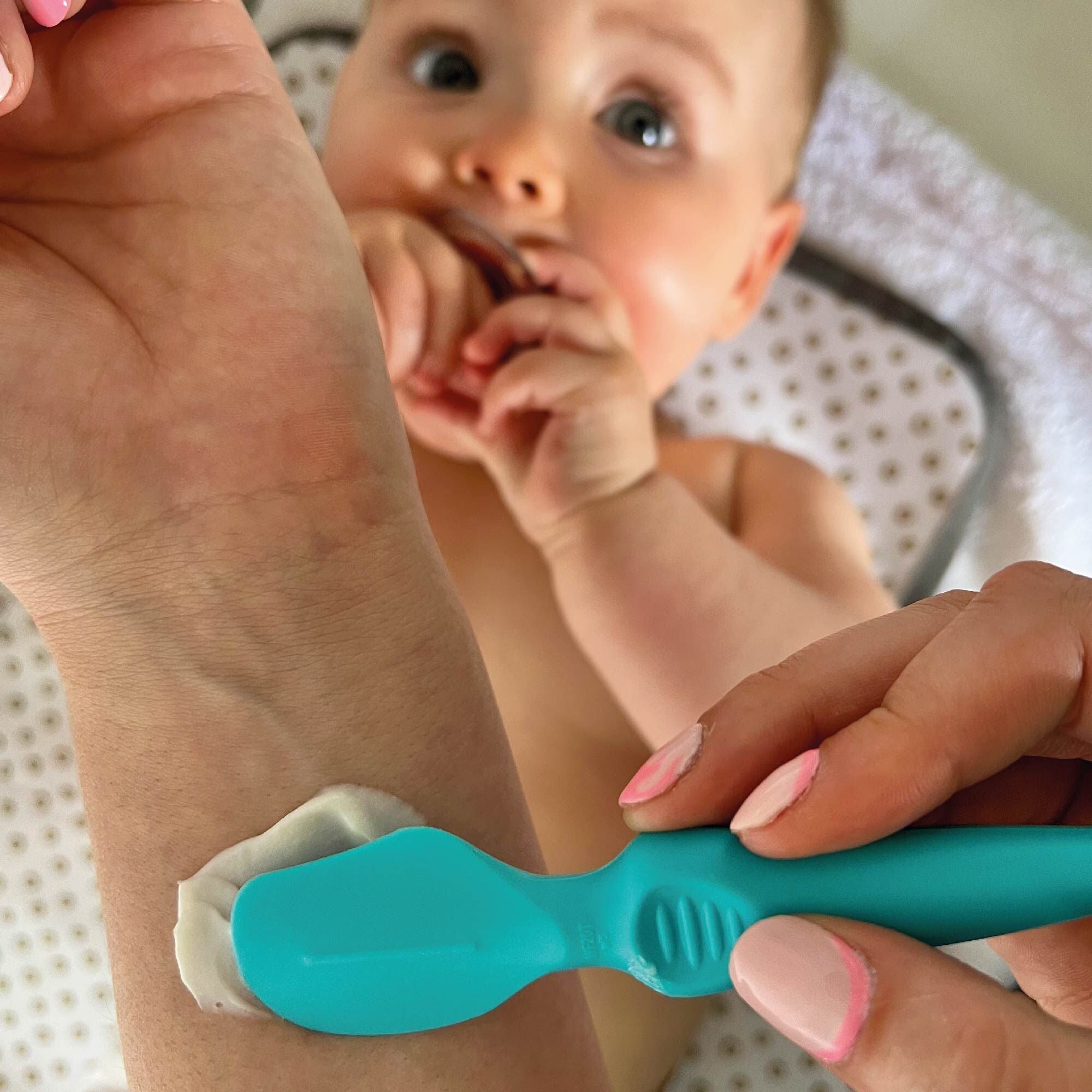 A nappy cream applicator by Nuby