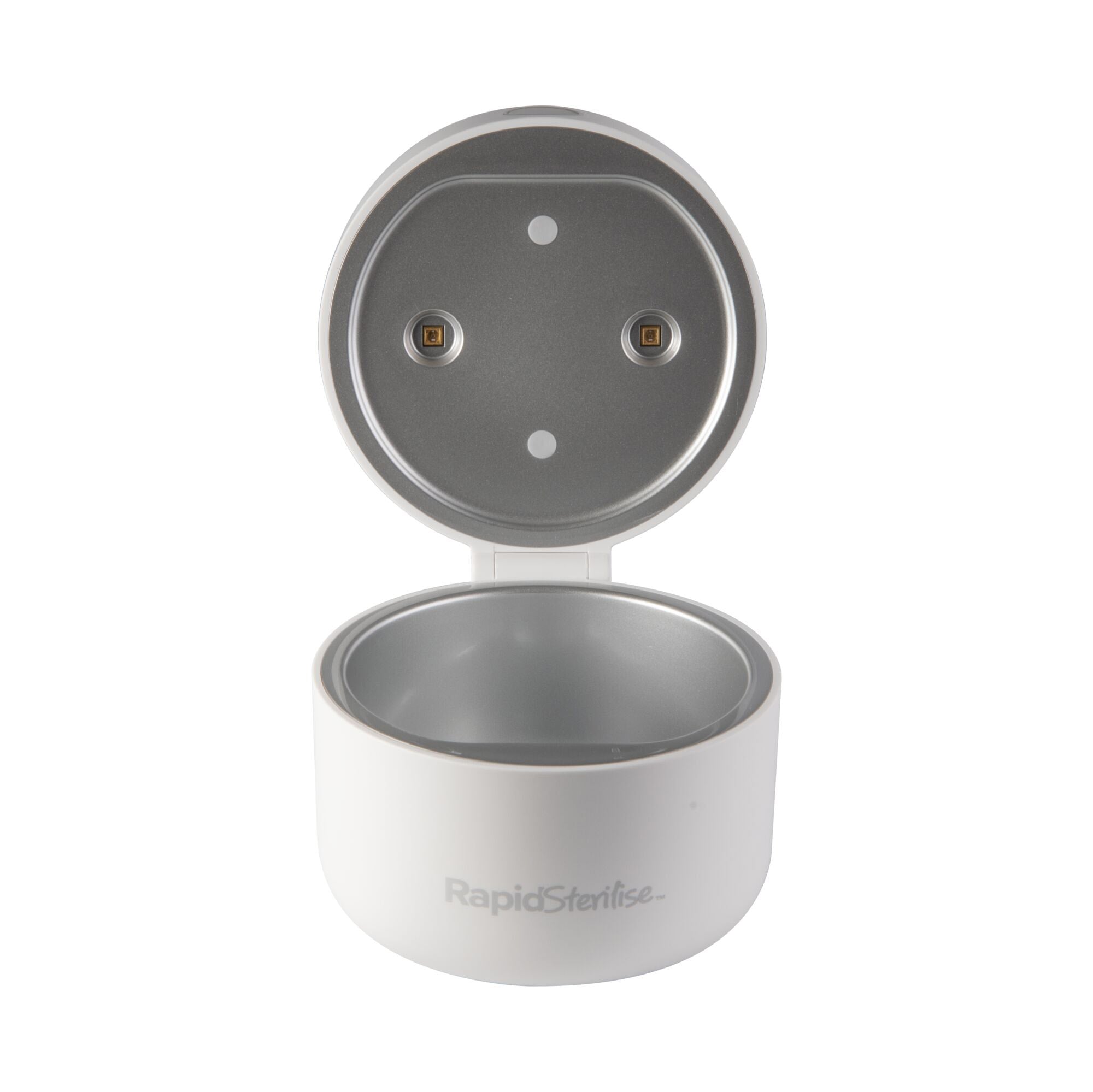 A small, round, white device labeled "RapidSterilise UV Soother Steriliser" features a hinged lid revealing a metallic interior and two circular buttons or lights inside.