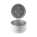 A small, round, white device labeled "RapidSterilise UV Soother Steriliser" features a hinged lid revealing a metallic interior and two circular buttons or lights inside.
