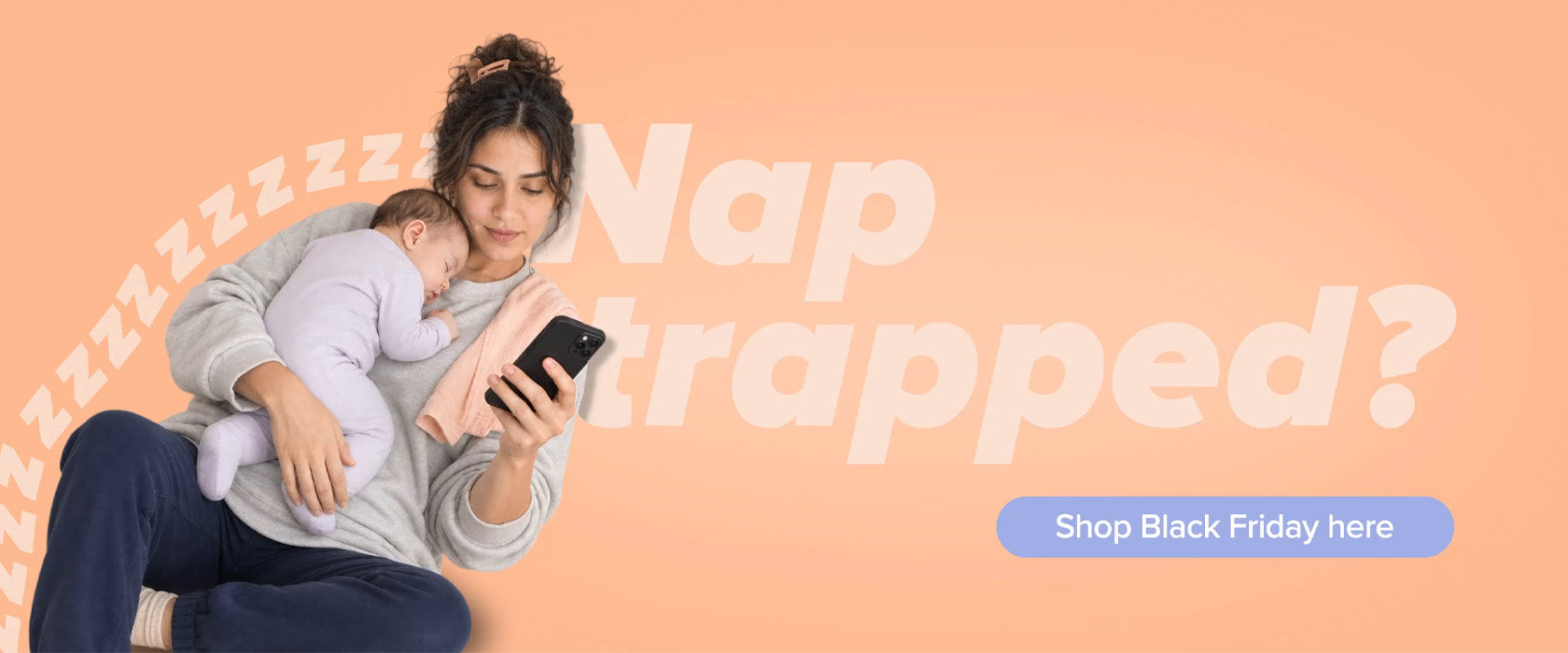 A woman holding their baby while they nap alongside their phone as they scroll.