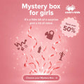 Pink advertisement for the Nuby Mystery Box for girls, featuring sparkling effects, red ribbons, toy silhouettes, "Save over 50%" text, a "Choose your Mystery Box" button, and the Cash for Kids logo in the corner.