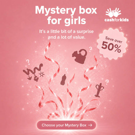 Pink advertisement for the Nuby Mystery Box for girls, featuring sparkling effects, red ribbons, toy silhouettes, "Save over 50%" text, a "Choose your Mystery Box" button, and the Cash for Kids logo in the corner.