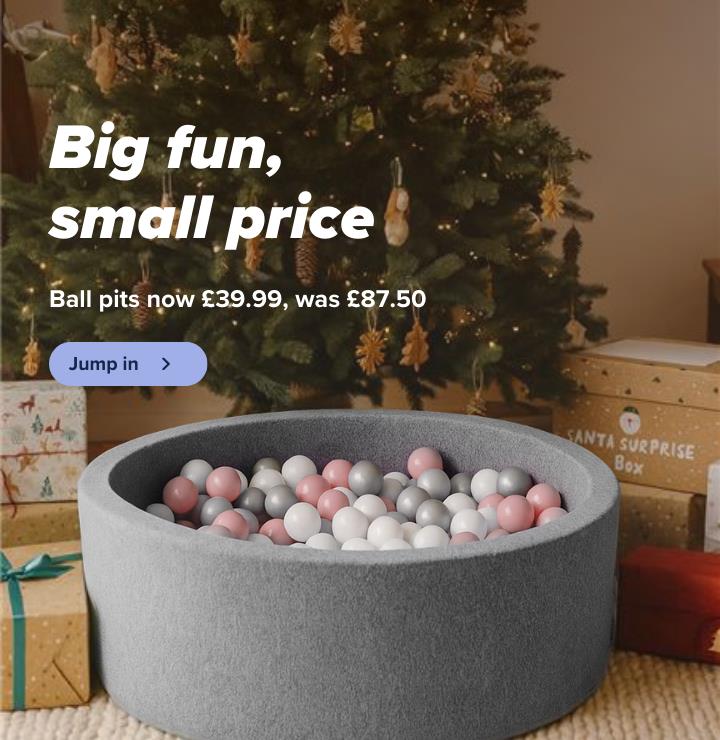 Ball pits now only £39.99, was £87.50. Perfect Christmas gift. Shop now. Banner showing a grey ball pit with pink and white balls, under a Christmas tree with presents. 