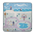 The Quilted Playmat features a vibrant scene with a lighthouse, sea, boat, houses, winding road, pond with ducks, trees, cat, dog, and birds beneath a cloudy sky—ideal as a cozy play space for babies.