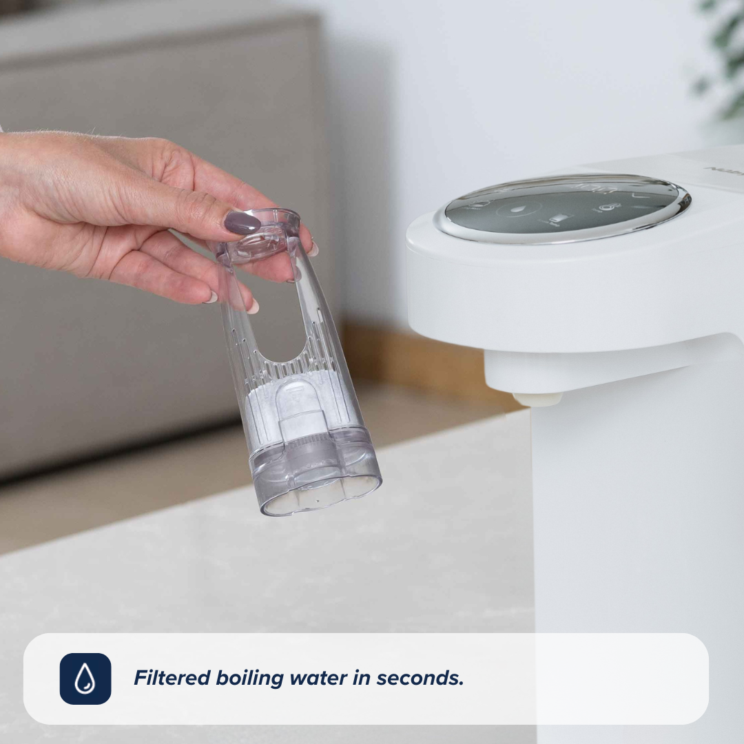 A RapidHot filter being held in front of a RapidHot in white, created by Nuby.