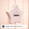 A white, star-shaped Biscuit Bear Musical Cot Mobile by Nuby UK hangs by a string with five front buttons. Text below reads: 6 calming lullabies to soothe baby to sleep, next to a speaker icon.