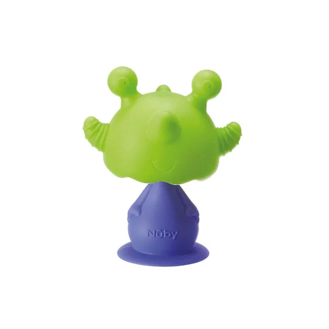 The Nuby Bobble Highchair & Teething Toy is a green and purple silicone alien with two antennae, wide ears, and a suction base for highchair use. The brand name “Nuby” is embossed on the base.