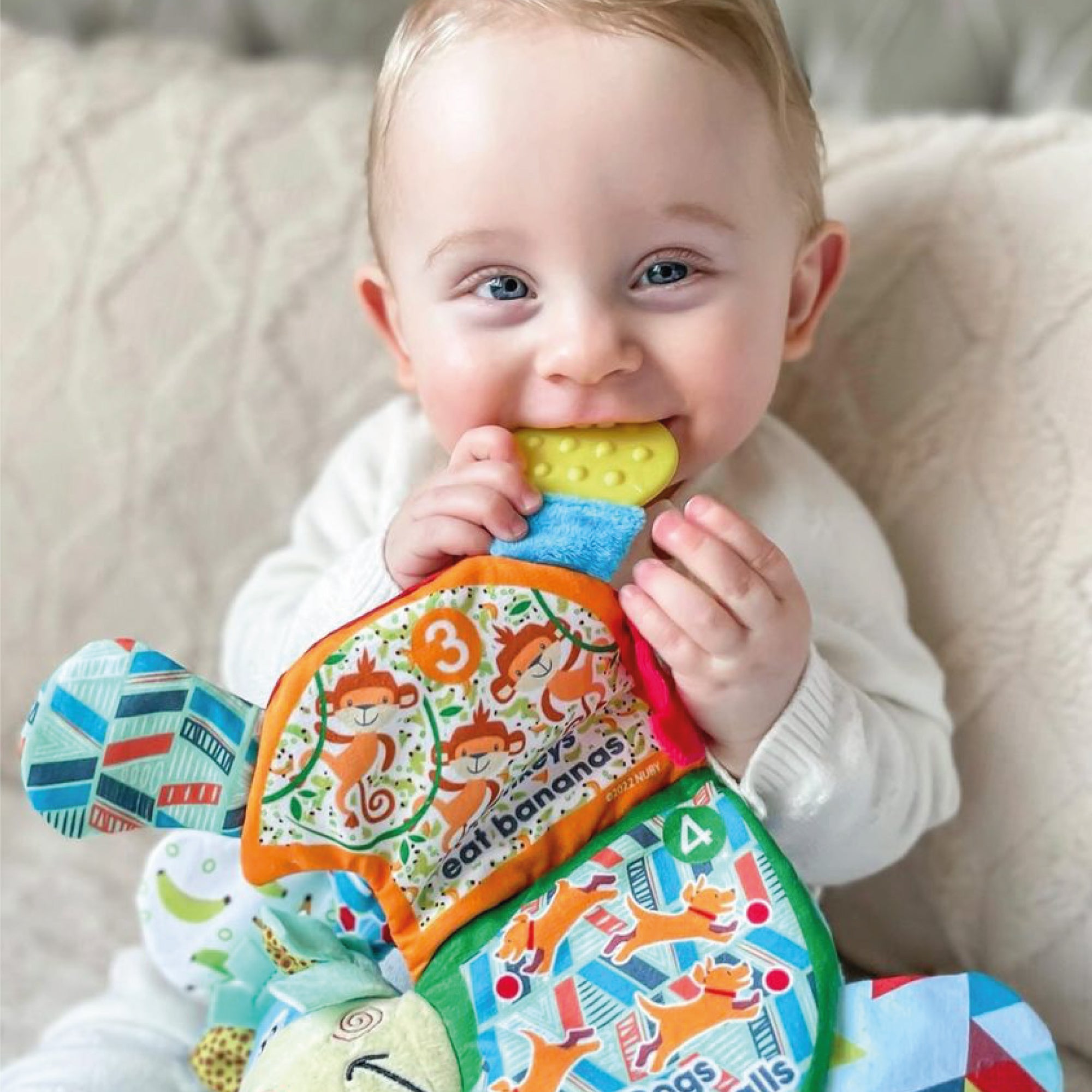 Nuby flip sale flop teether book